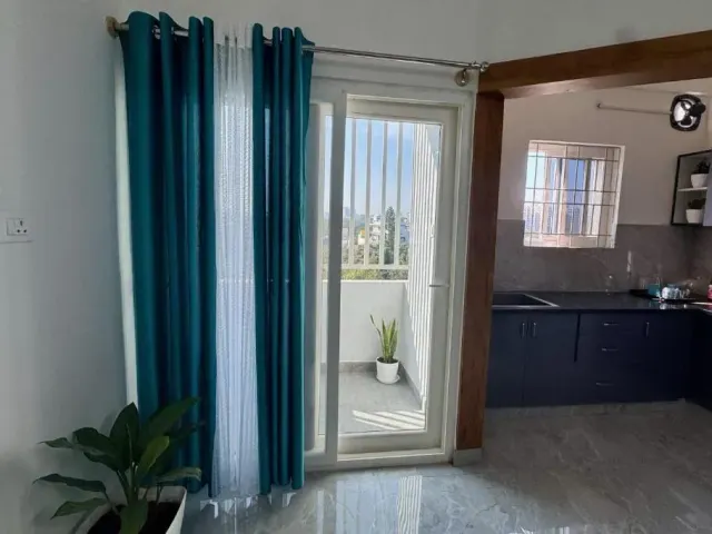 Photo 9 of 10 at Truelife Whitefield - Premium 1 BHK Apartments - Prime location - Easy access to Main Rd - Metro - ITPL - Fast WiFi - Kitchen - Smart TV - Power backup - Park - Garden views