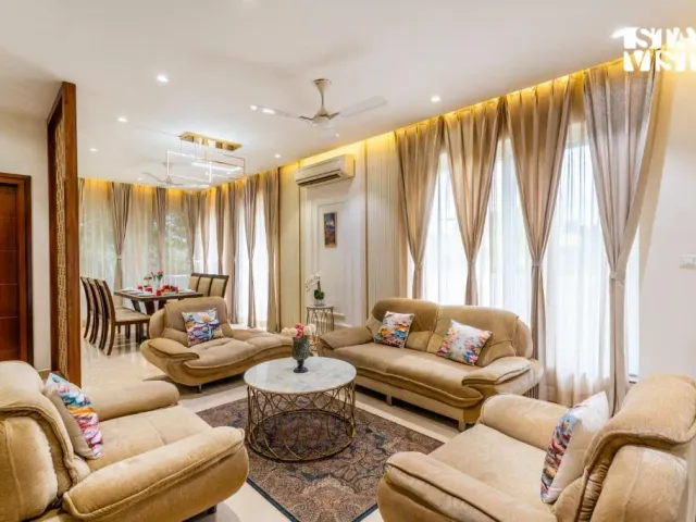 Photo 3 of 10 at Brickstone Villa by VEO, StayVista - 3BHK with Lake View & Shared Pool